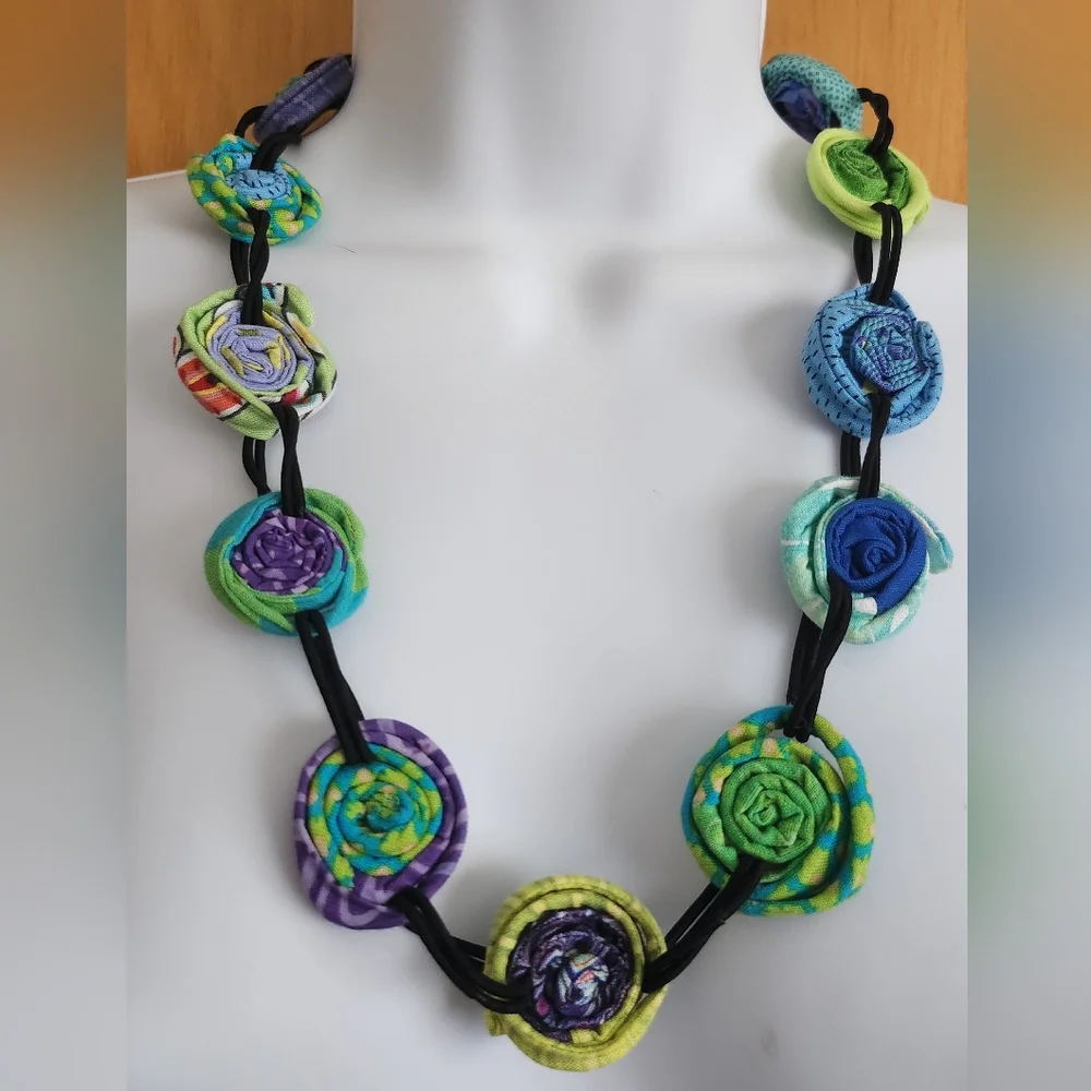 Multi colored coiled fabric necklace